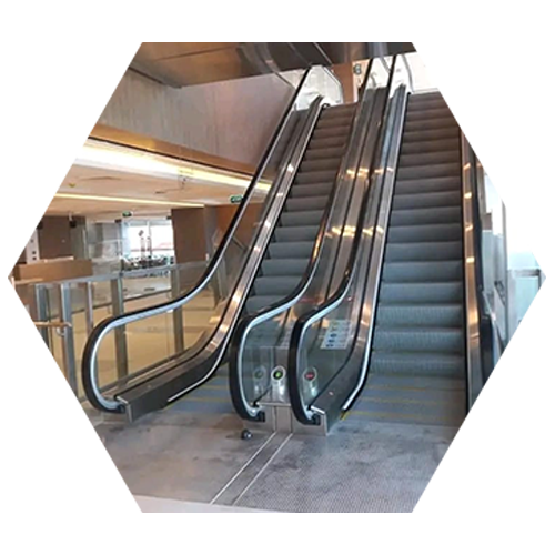 Escalators in a busy shopping mall