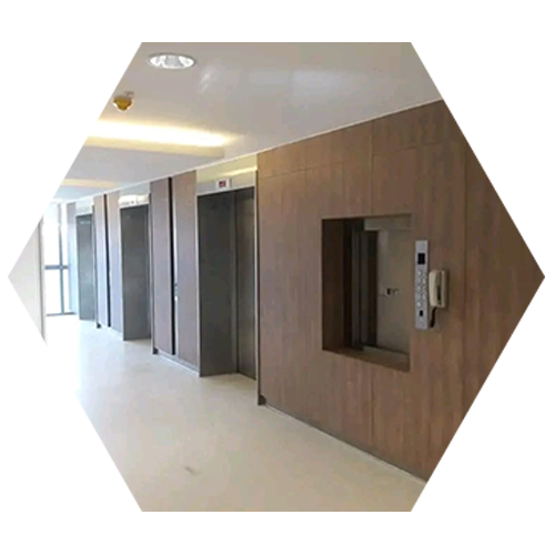 Compact dumbwaiter installed in a restaurant kitchen