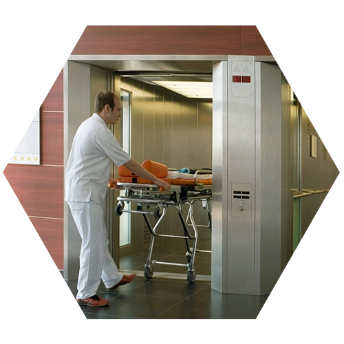 Hospital bed elevator designed for patient transport