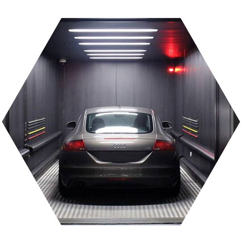 Car elevator transporting vehicles in a multi-level garage